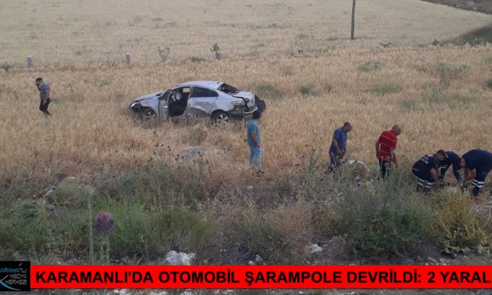 KARAMANLI’DA OTOMOBİL ŞARAMPOLE DEVRİLDİ: 2 YARALI